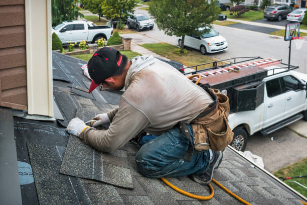 Professional Roofing technician working in Walcott, IA